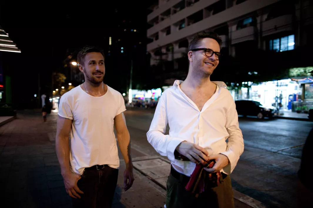 ONLY GOD FORGIVES - Still of Ryan Gosling and Nicolas Winding Refn